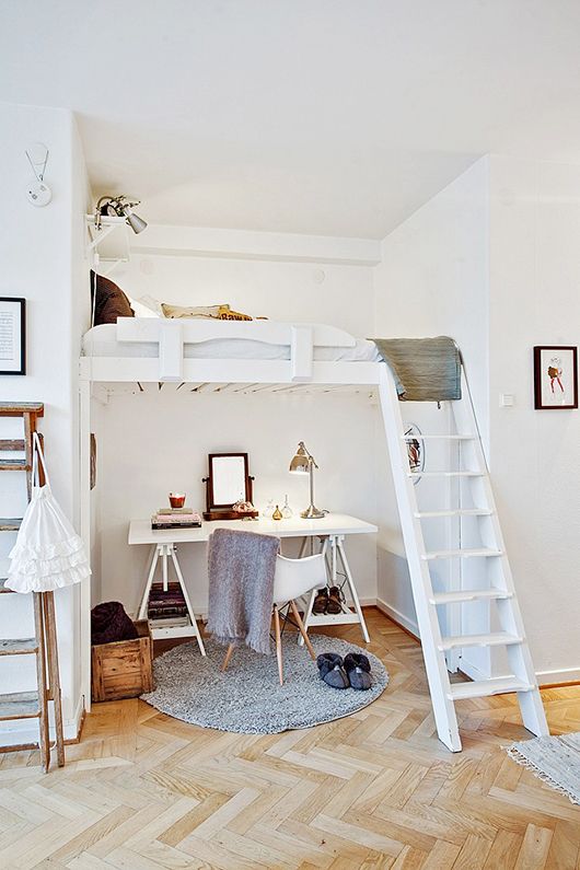 White Ladder Access to a Loft Bed Creates a Cozy Nook