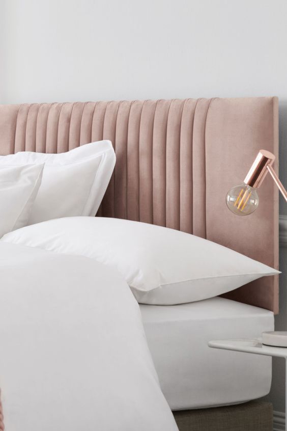 Vertical Pleats on a Pink Headboard Add Soft Texture