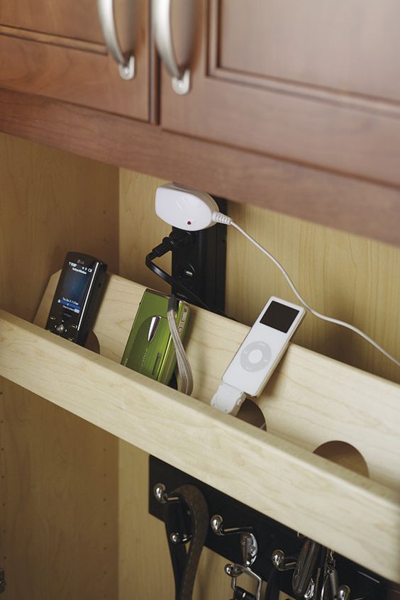 Wooden Slots Inside Cabinet Keep Devices Upright