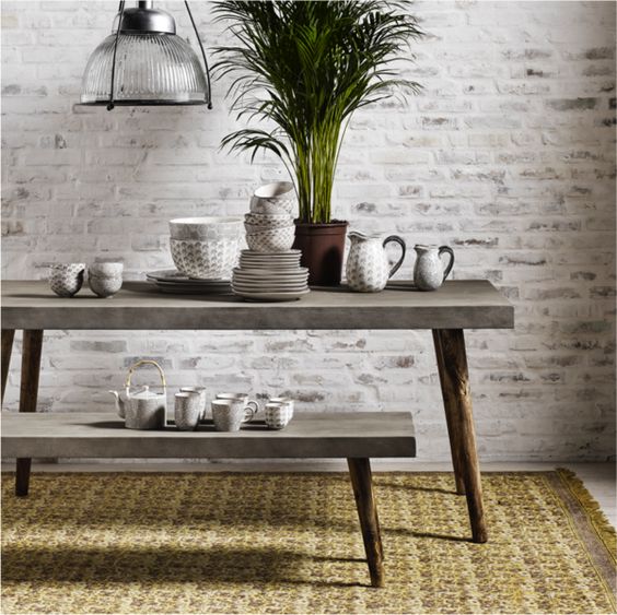 Concrete Table With Integrated Bench for Dining Areas