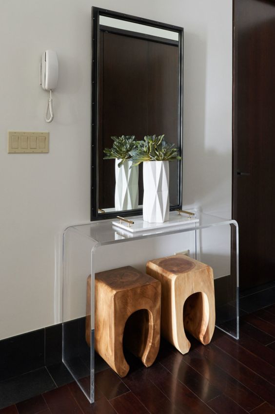 Pair a Clear Console with Sculptural Wood Stools