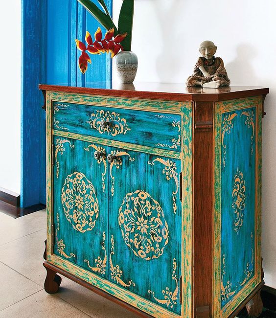 Distressed Teal Cabinet With Gold Stenciled Motifs