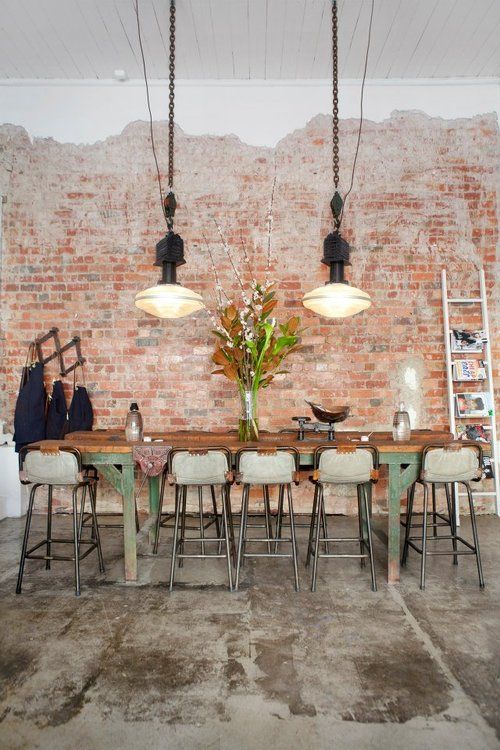 Industrial Pendant Lights Add Task Lighting Over a Long Table