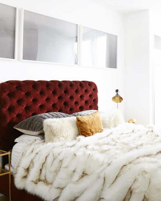 Deep Red Velvet Headboard Adds Rich Texture to a White Bedroom
