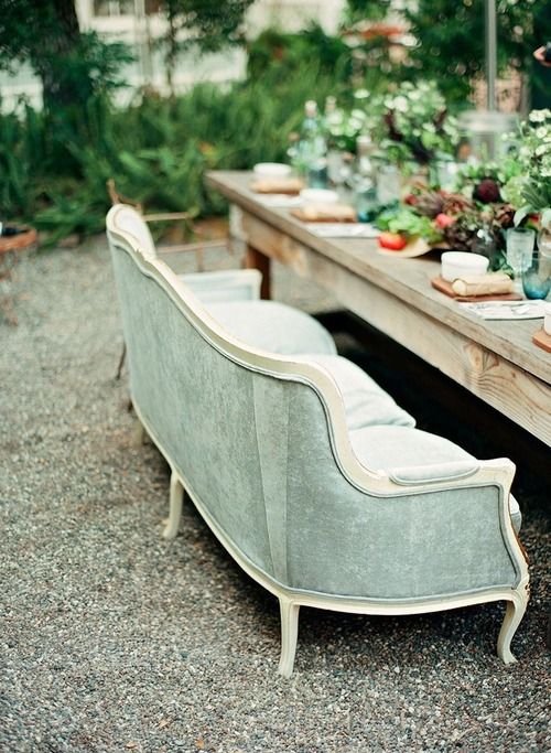 Ornate Sofa Adds Unexpected Comfort to Gravel Patio