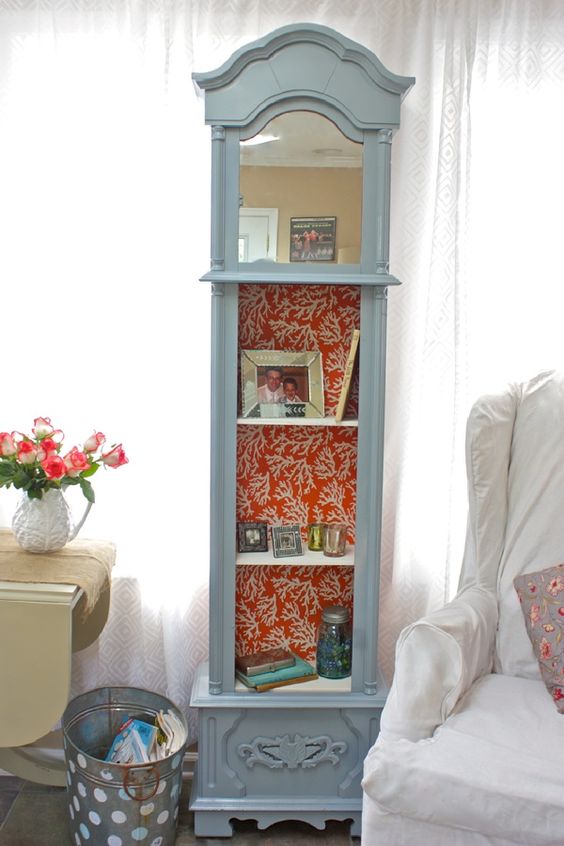 Gray Grandfather Clock With Coral-Patterned Backing