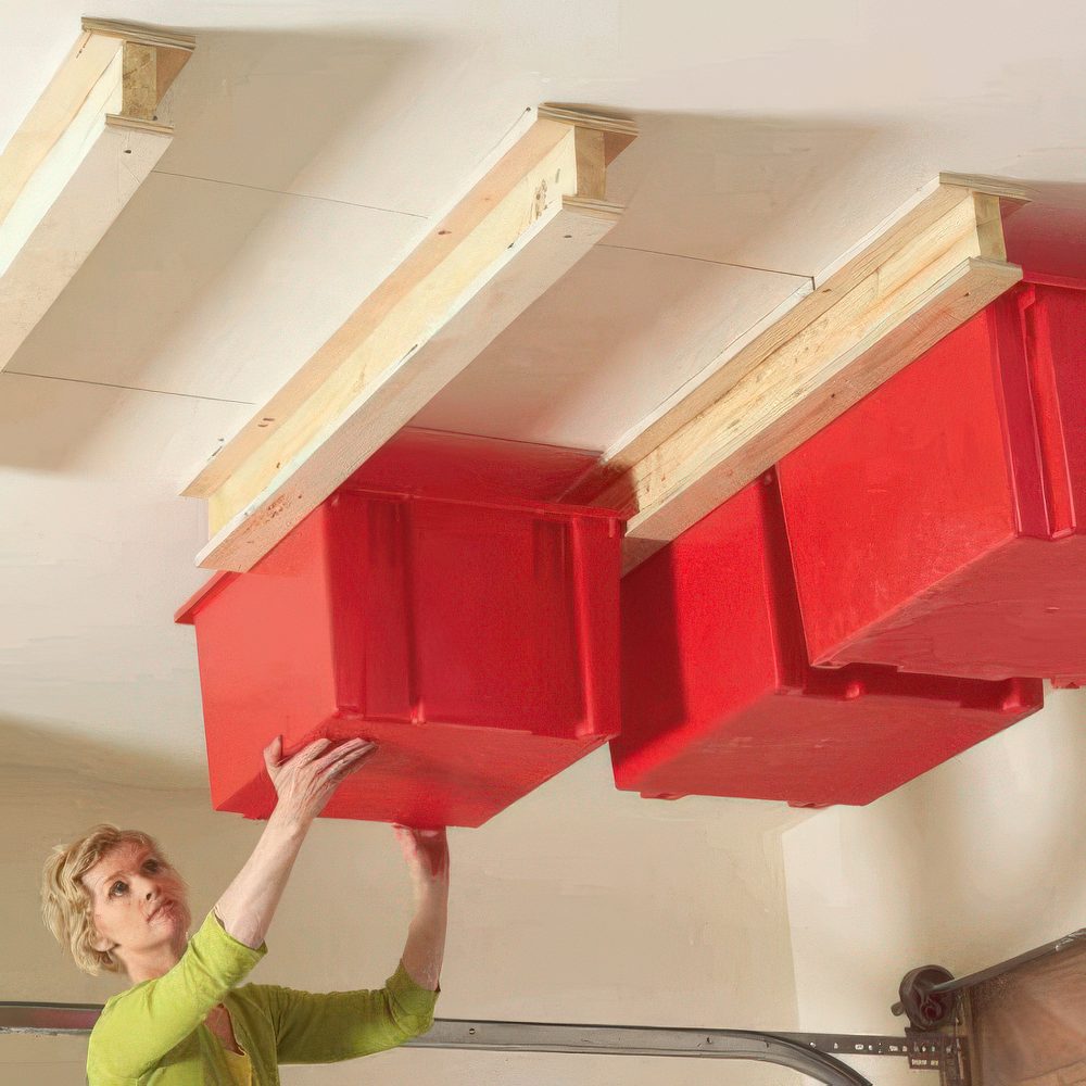 Ceiling-Mounted Red Totes for Overhead Garage Storage