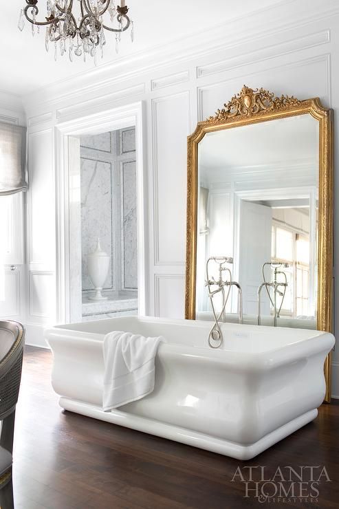 Ornate Gold Mirror Adds Glamour Behind a Freestanding Tub