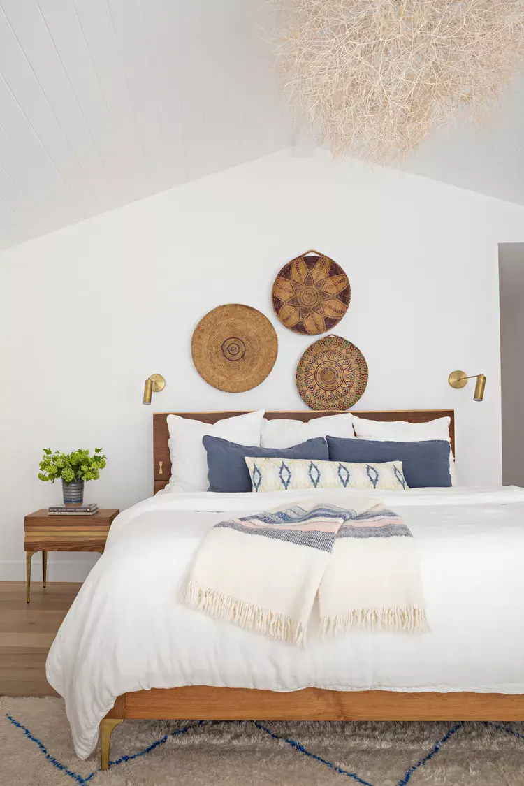 Woven Wall Baskets Add Natural Texture Above the Bed