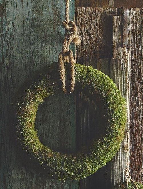 Moss Wreath Adds Organic Texture to Rustic Wood