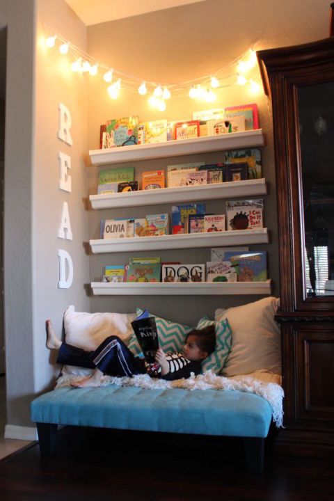 Floating Shelves Showcase a Cozy Reading Nook