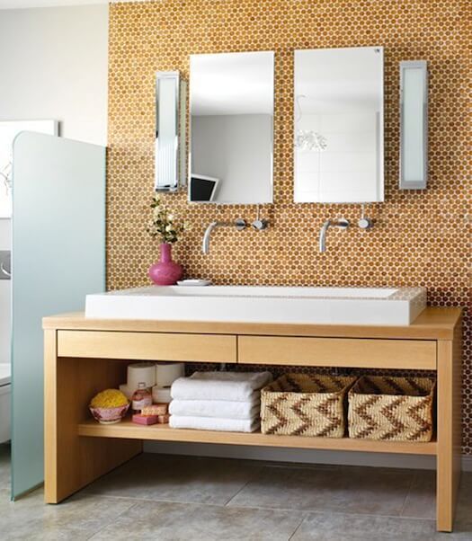Woven Baskets Corral Bathroom Essentials Under a Vanity