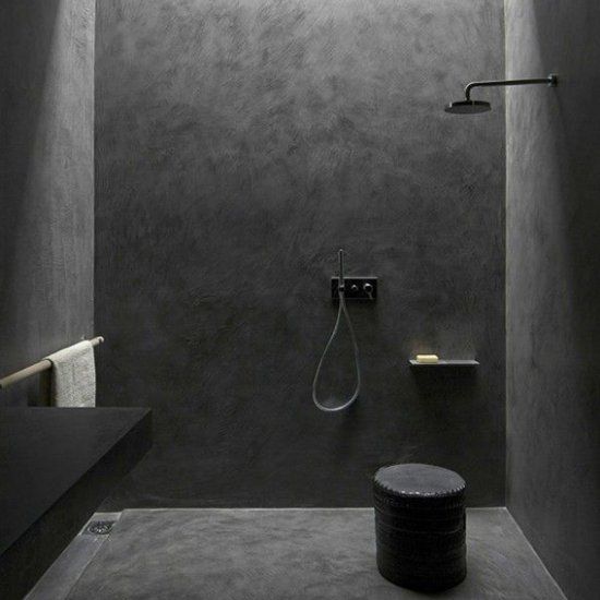 Textured Black Walls Create a Moody, Immersive Shower Space