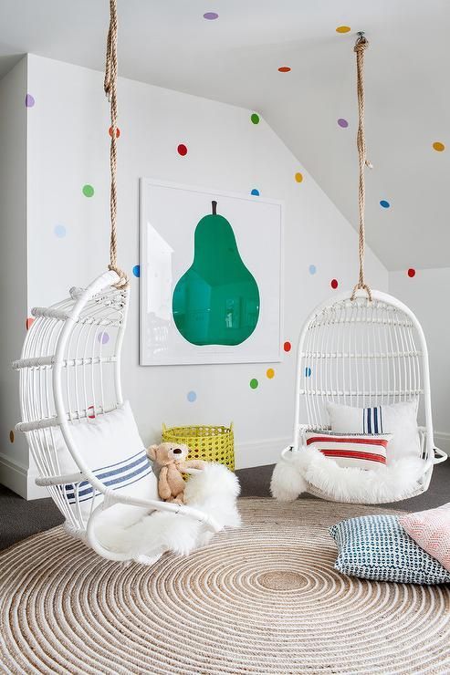 White Hanging Chairs Add Cozy Reading Nooks
