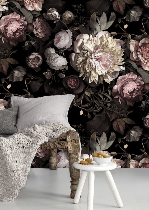 Dark Floral Wallpaper Creates a Dramatic Backdrop for a Cozy Nook