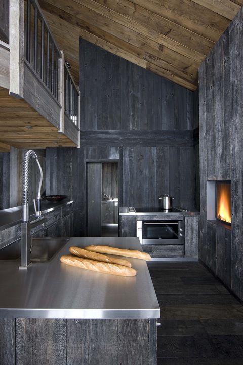 Dark Wood Walls Create a Cozy Cabin Atmosphere