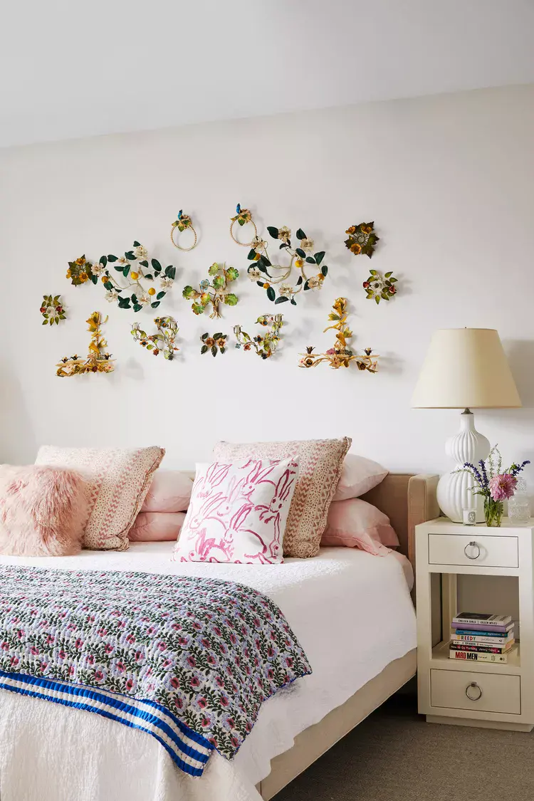 Whimsical Wall Sconces Add Floral Charm Above the Bed