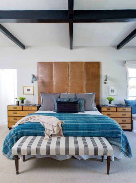Paneled Leather Headboard Creates a Dramatic Bedroom Focal Point