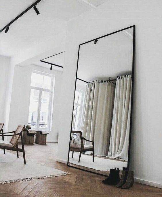 Visually Expand Your Space with an Oversized Floor Mirror
