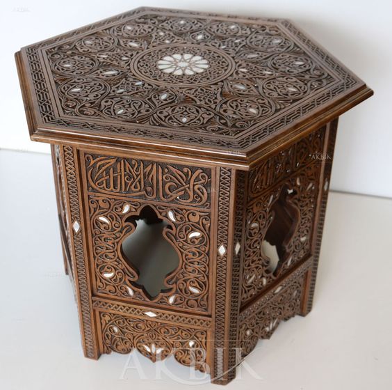 Showcase Wood Carving on a Hexagonal Table