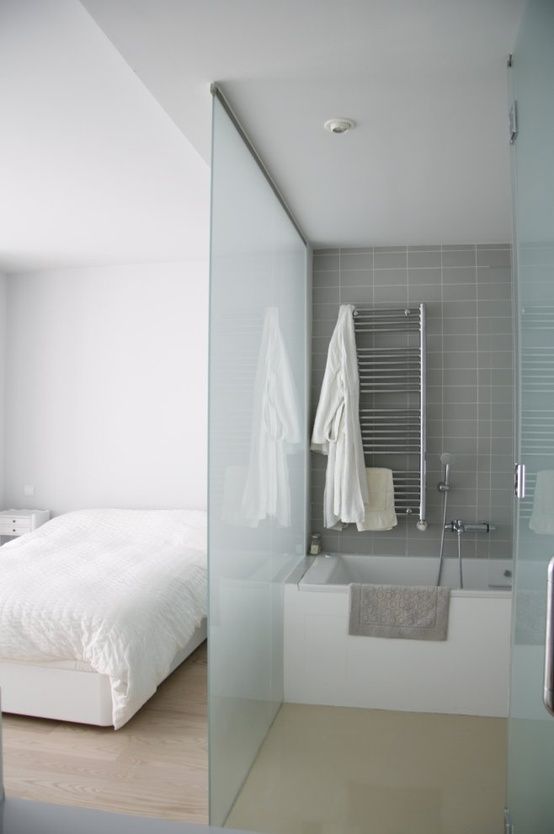 Keep Towels Warm with a Heated Rack Above the Tub