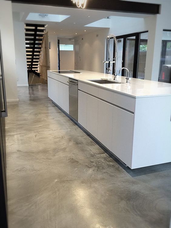 Opt for a Minimalist White Kitchen Island with Integrated Appliances