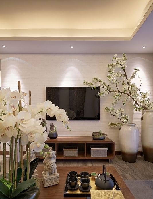 Balance Your Media Console with Tall White Urns