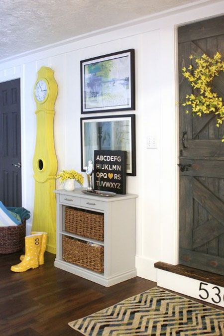 Bright Yellow Mora Clock Adds a Pop of Color to Entryway