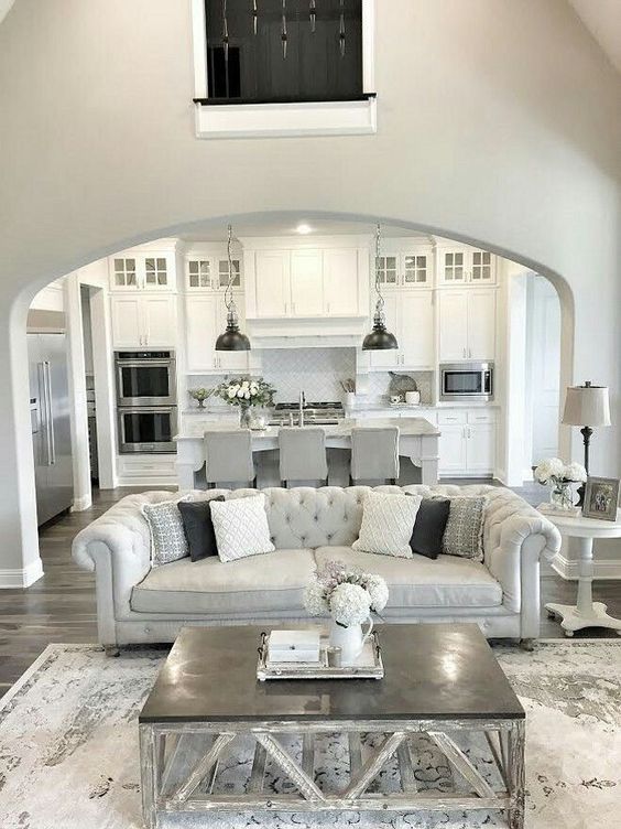 Tufted Sofa with Patterned Throw Pillows