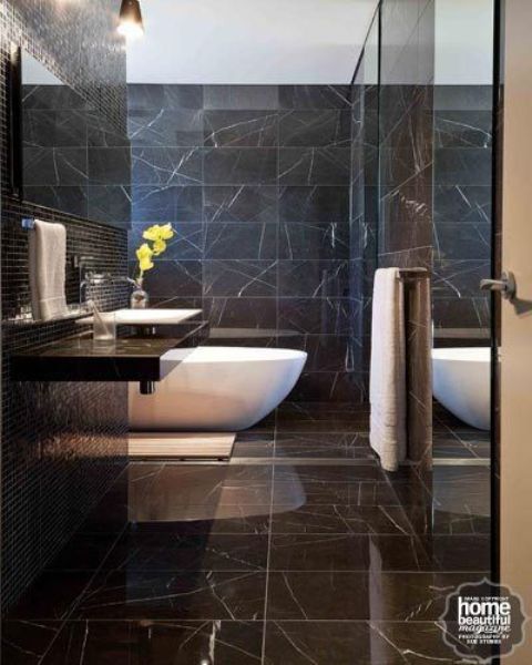 Unify Your Space with Dark Marble Walls and Floors