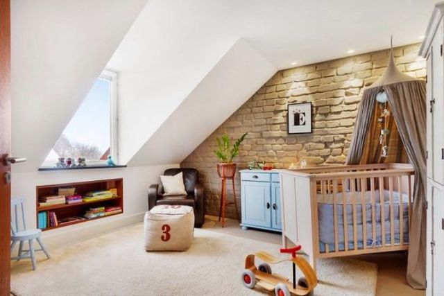 Built-In Shelves That Organize Books Under a Slanted Ceiling