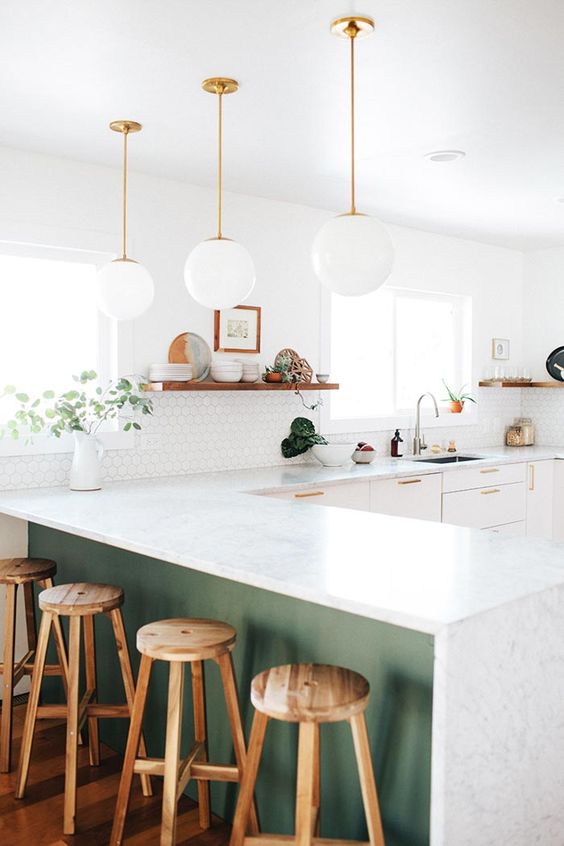 Ground Your White Kitchen with a Sage Green Island Base