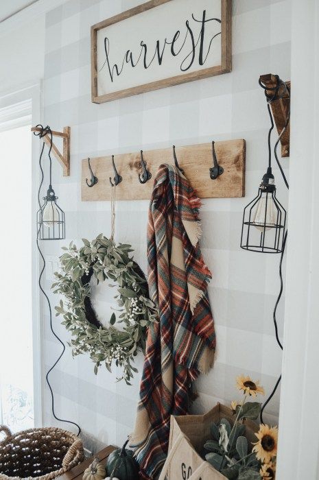 Wooden Hook Rack with Seasonal Wreath and Plaid Blanket
