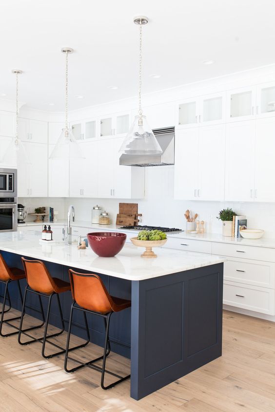Anchor a White Kitchen with a Paneled Navy Island
