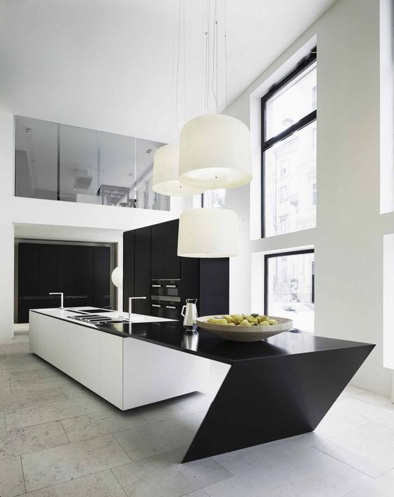 Large Drum Pendants Soften a Sharp Island