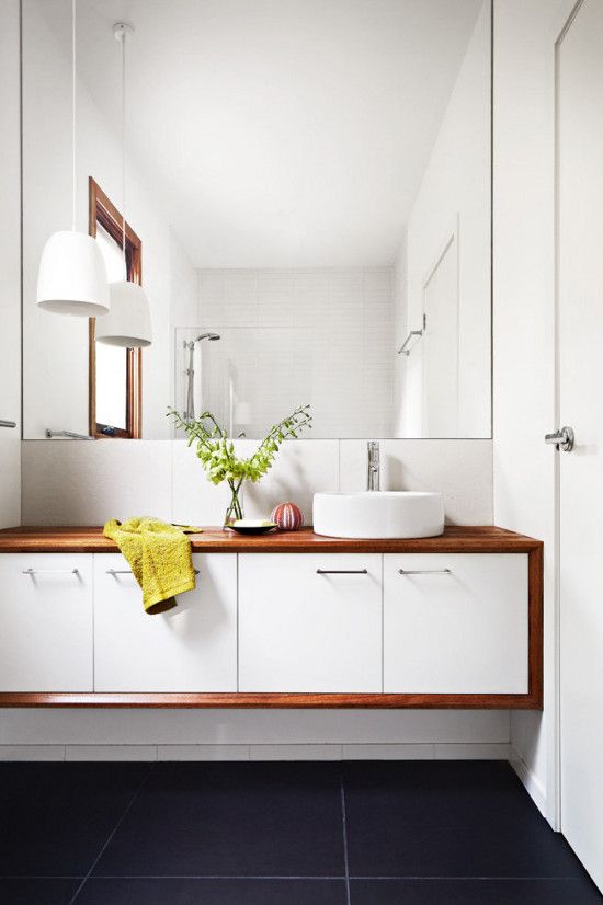 White Vanity Cabinet with Warm Wood Countertop