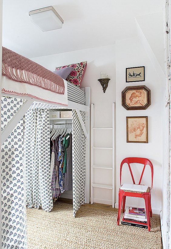 Patterned Curtains Conceal a Loft Bed's Closet Space
