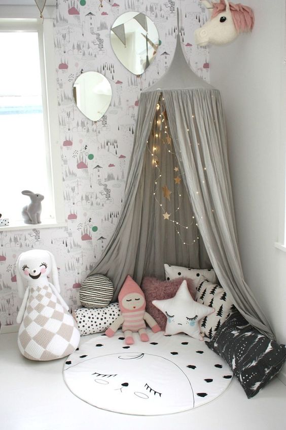 Grey Canopy With Fairy Lights Creates a Cozy Reading Nook