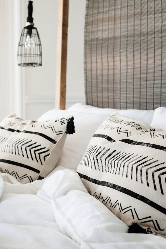 Incorporate Black and White Graphic Pillows for Bold Contrast