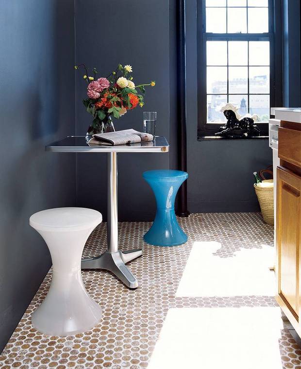 Hourglass Stools Add Playful Seating to a Small Table