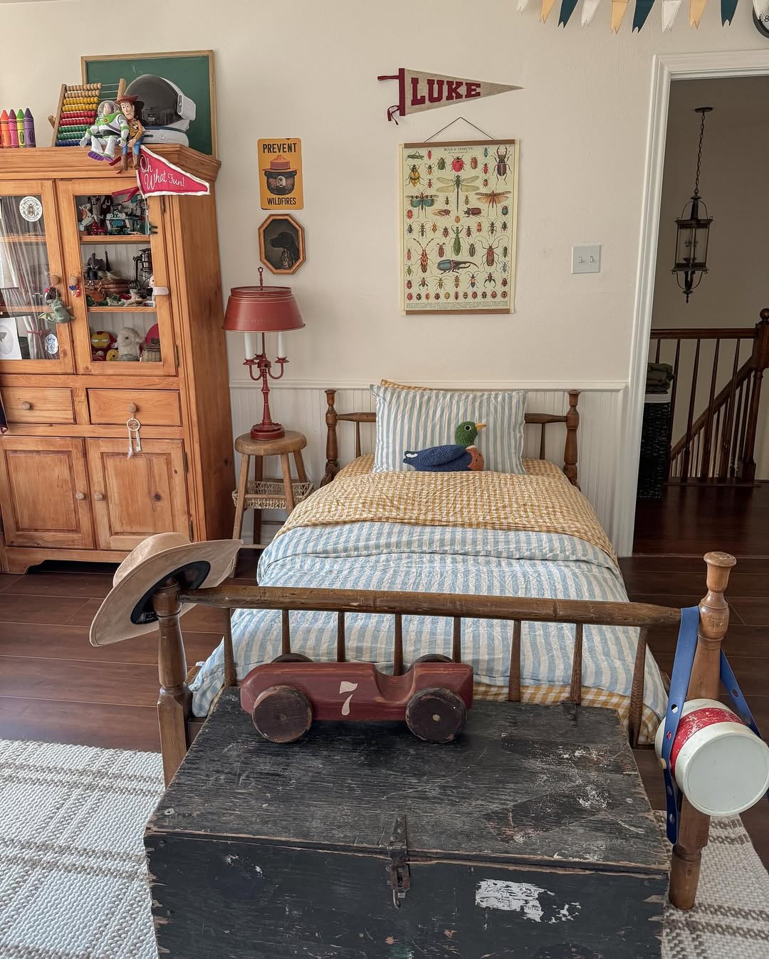 Vintage Bug Poster Adds Educational Decor Above the Bed