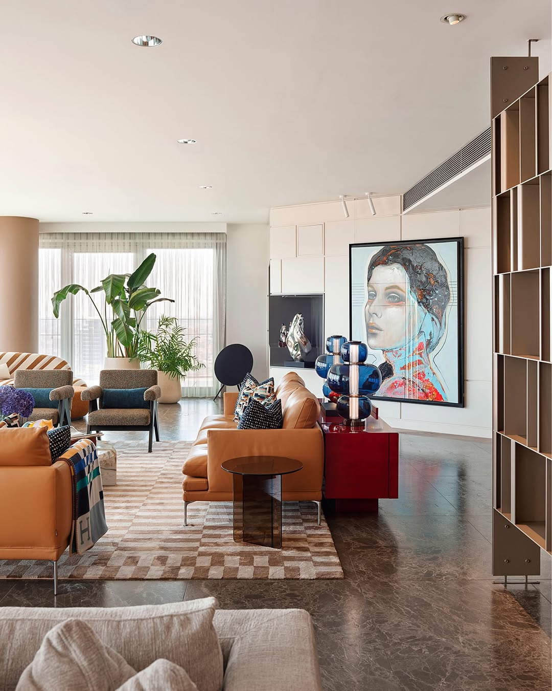 Red Cabinet Acts As A Bold Art Pedestal