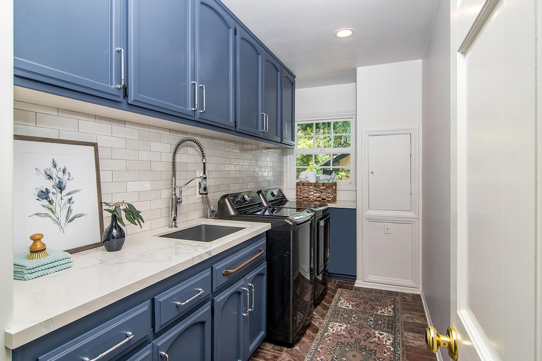 Deep Blue Shaker Cabinets with Subway Tile