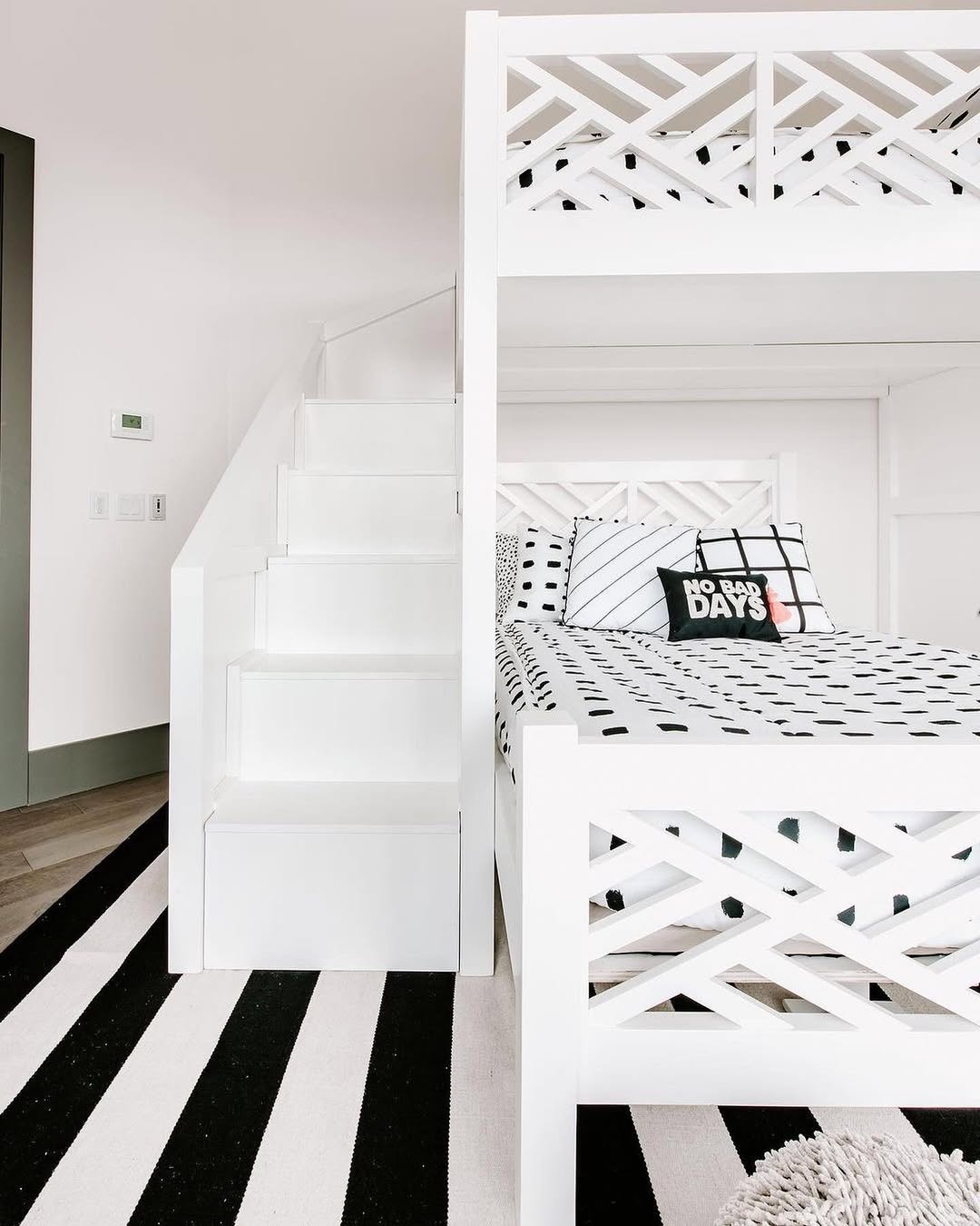 White Bunk Bed with Geometric Headboard Accents