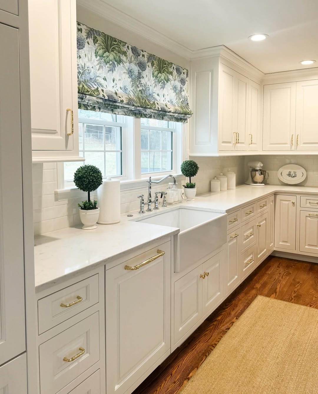 Topiary Trees Add Symmetry and Life to Kitchen Windows