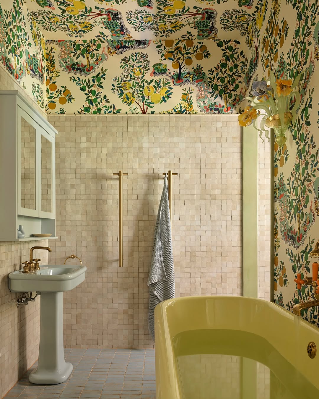 Gold Towel Bars Add Warm Metallic Accents to Neutral Tile