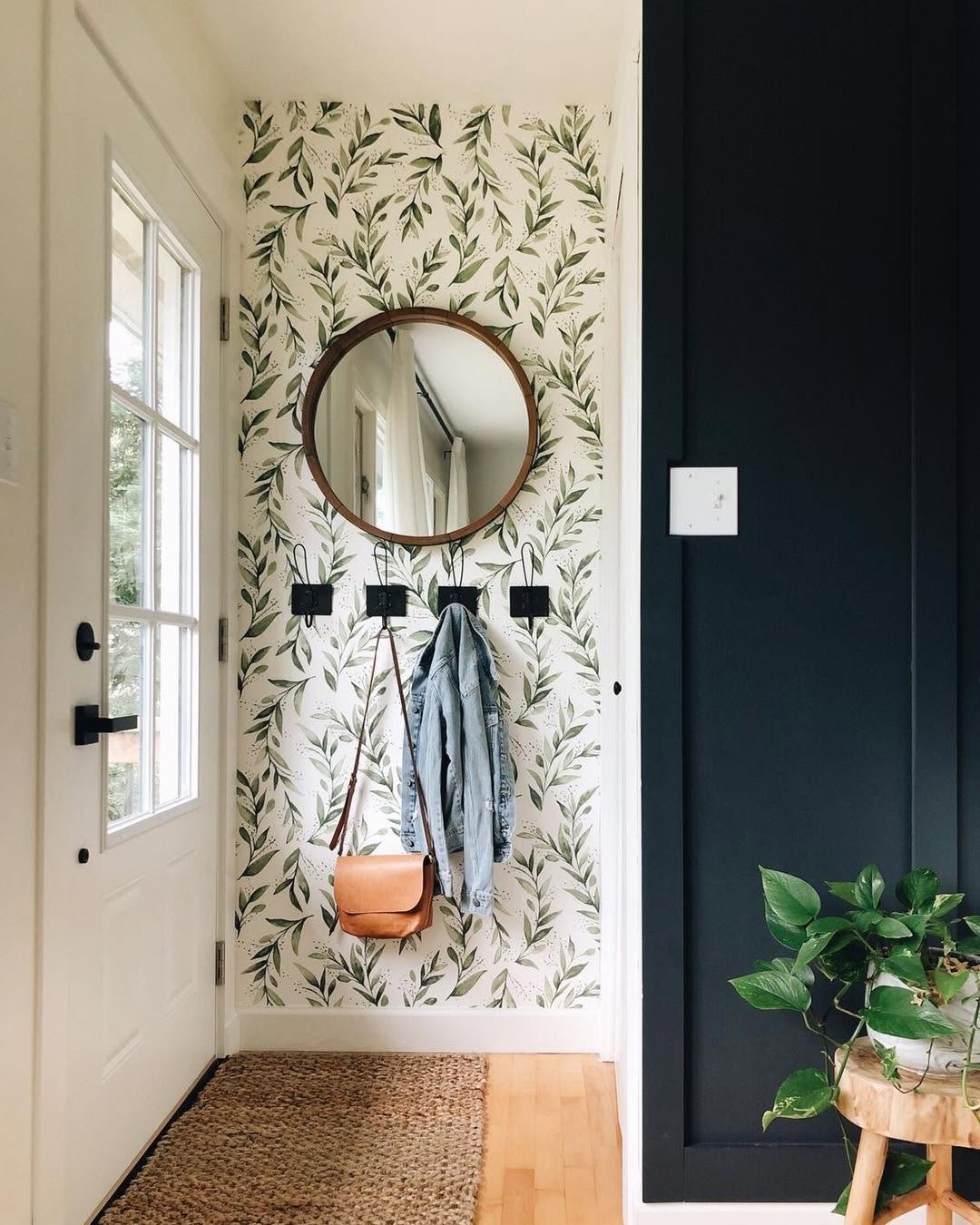Botanical Wallpaper and Matte Black Hooks for a Fresh Entry