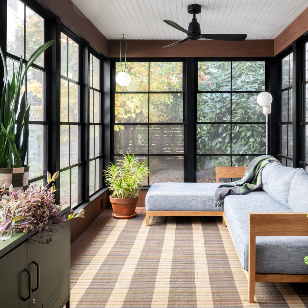 Striped Rug Anchors Sunroom Seating