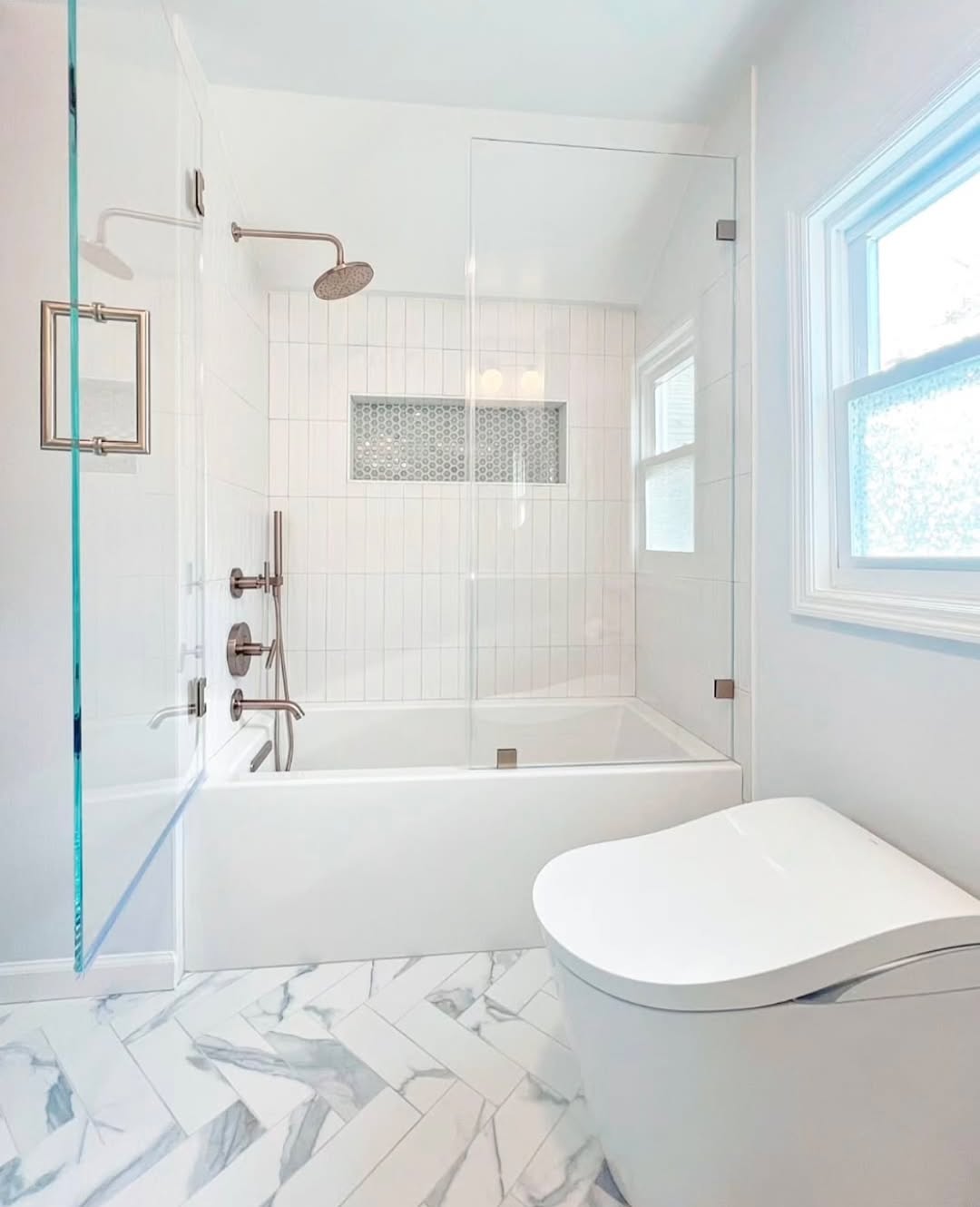 Glass Shower Enclosure Adds Openness to Small Bathrooms
