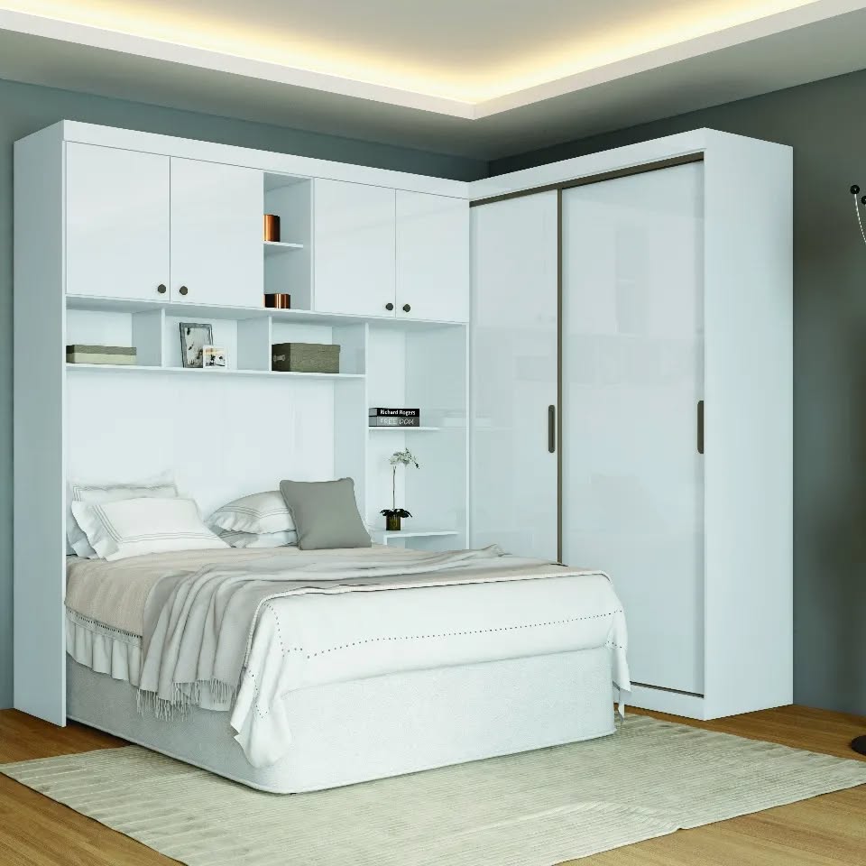 Built-in White Wardrobe and Shelving Unit Above Bed